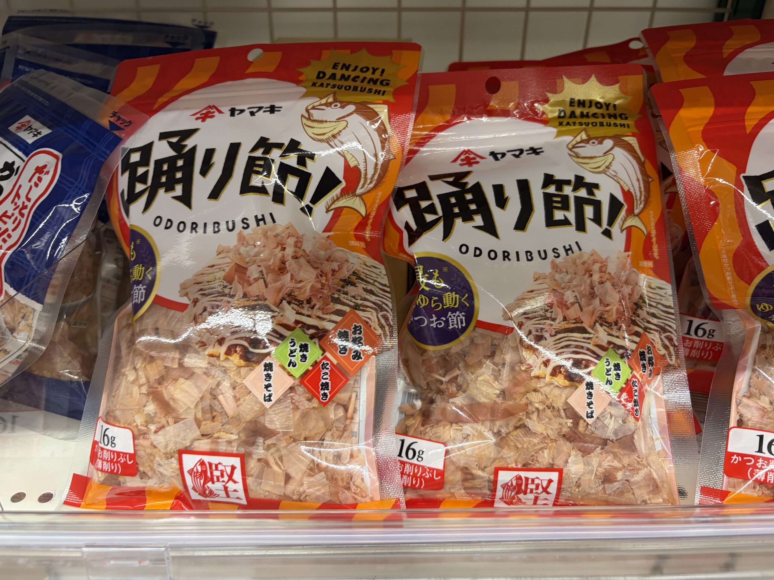 Packets of katsuobushi bonito flakes showing icons for okonomiyaki, takoyaki and yakisoba
